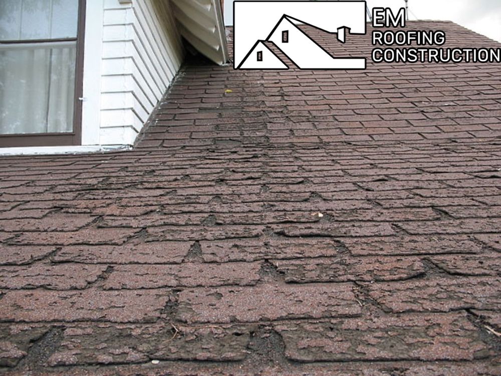 Slide of EM Roofing Construction