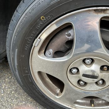 Ball Ground Tire & Auto - Proof of the loose lugs and damage to the caliper OH LOOK A MISSING LUG - Tires Near Me - Ball Ground, Georgia Ball Ground Tire & Auto - Proof of the loose lugs and damage to the caliper OH LOOK A MISSING LUG - Tires Near Me - Ball Ground, Georgia