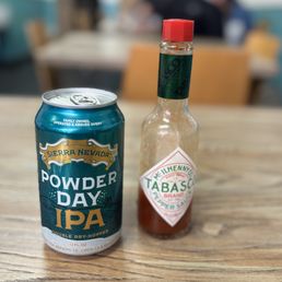 Plenty of beer choices and also many types of hot sauce available Plenty of beer choices and also many types of hot sauce available