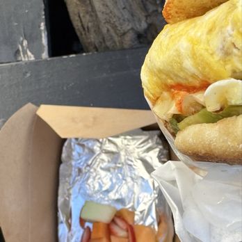 16th Street Diner - Took too many bites but you get the idea of this big breakfast sandwich beauty. Comes with fruit. - Breakfast & Brunch Near Me - San Francisco, California