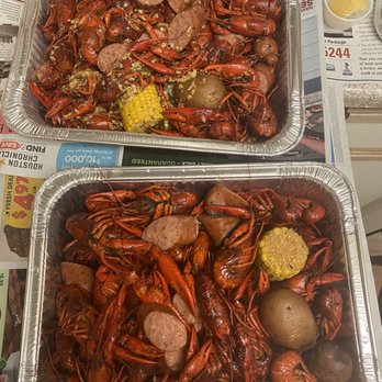 Kraken Wing & Seafood - 5lbs get 1lb for free special. Garlic butter on top and Cajun at the bottom. - Chicken Wings Near Me - Sugar Land, Texas