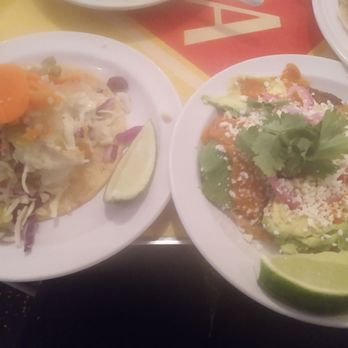 Tacombi - Crispy fish taco (left) and avocado tostada (right) - Mexican Near Me - Brooklyn, New York Tacombi - Crispy fish taco (left) and avocado tostada (right) - Mexican Near Me - Brooklyn, New York