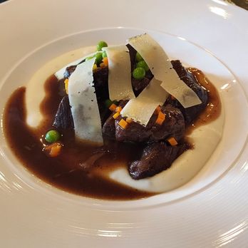 La Tremenda - Best Spanish Restaurant in Miami - Tender braised beef ( with red wine reduction source) - Spanish Near Me - Doral, Florida La Tremenda - Best Spanish Restaurant in Miami - Tender braised beef ( with red wine reduction source) - Spanish Near Me - Doral, Florida