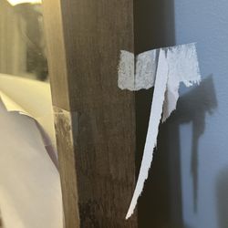 Winners - Only 3 of the pieces of tape that pulled the paint off the frame of my new mirror..