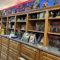 Antiquarium Books & Collectibles - Never books and figures
