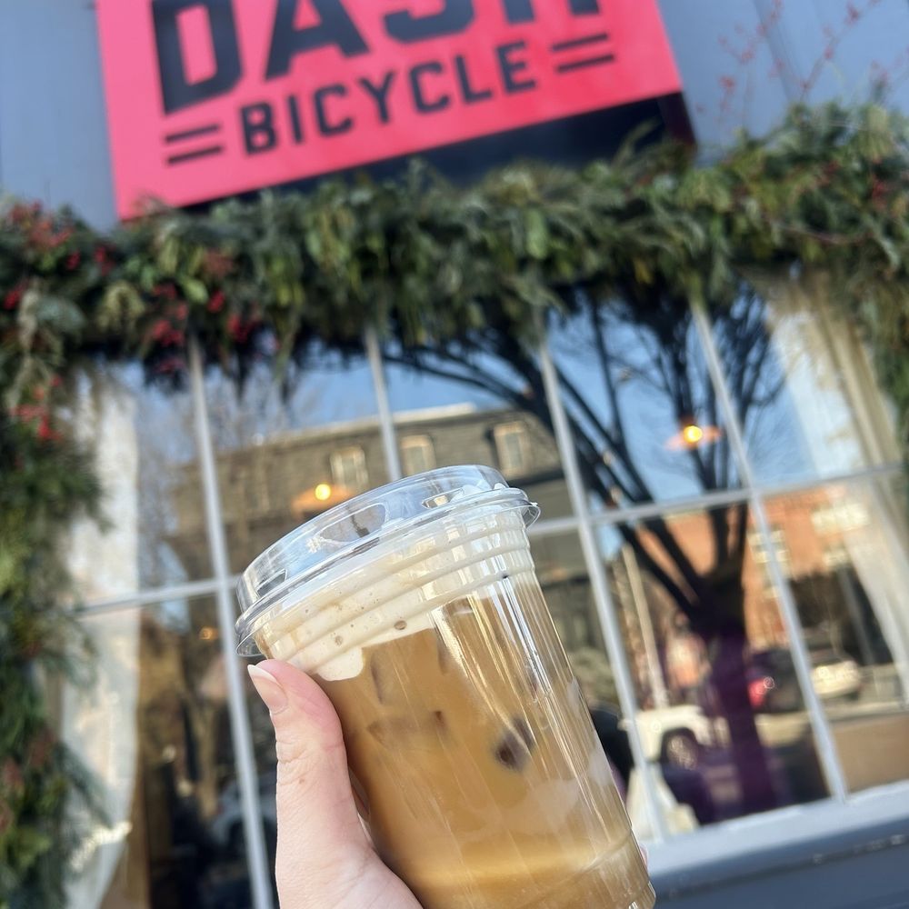 The Nitro Bar- Providence - Caramelized banana latte with cold foam in front of the store front - Coffee & Tea Near Me - Providence, Rhode Island The Nitro Bar- Providence - Caramelized banana latte with cold foam in front of the store front - Coffee & Tea Near Me - Providence, Rhode Island