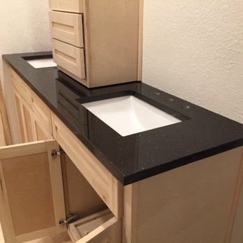 Flooring & Granite By Silvas - a sink and cabinets - Kitchen & Bath Near Me - Coppell, Texas Flooring & Granite By Silvas - a sink and cabinets - Kitchen & Bath Near Me - Coppell, Texas