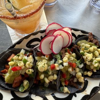 Kalaveras - With corn salad and green salsa. - Cocktail Bars Near Me - Pasadena, California
