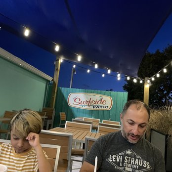 Brock's Surfside Grill & Pizzeria - Outdoor patio. Super cute. - Pizza Near Me - Jensen Beach, Florida