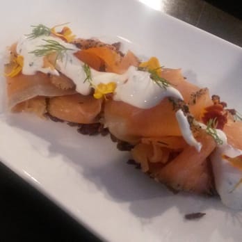 Hotel Ändra Seattle - MGallery Collection - Gravlax Smorgasbord.  Cured salmon, potato latke, clabber cream, fresh dill, and edible flower petals. - Hotels Near Me - Seattle, Washington