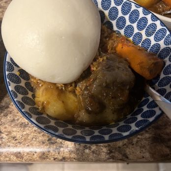 Calabash African Kitchen - Oxtail soup, fufu and Side of Jollof Rice - African Near Me - Las Vegas, Nevada