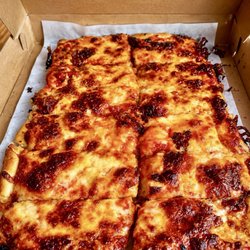 Len & Jo's - Delicious well done mixed pie . Cheese is mozzarella and American