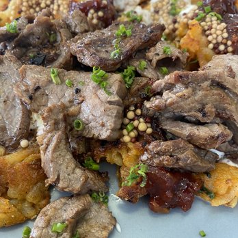 Pickford’s Sundries - Smothered potatoes with steak (spicy but really good!) - American Near Me - Tampa, Florida Pickford’s Sundries - Smothered potatoes with steak (spicy but really good!) - American Near Me - Tampa, Florida