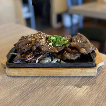 Jip Bap - Galbi (grilled marinated short ribs with onions and sesame seeds; served with rice on a hot plate) - Korean Near Me - Los Angeles, California Jip Bap - Galbi (grilled marinated short ribs with onions and sesame seeds; served with rice on a hot plate) - Korean Near Me - Los Angeles, California