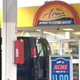 a truck at a gas station