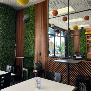 Antojitos Martin - a dining area with a bar and tables - Juice Bars & Smoothies Near Me - Inglewood, California