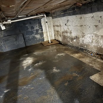 Murphy’s Renovations - Basement photo of water after sump pump was installed - General Contractors Near Me - Troy, New York