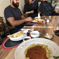 Confetti - Spinach and cheese ravioli with bolognese sauce