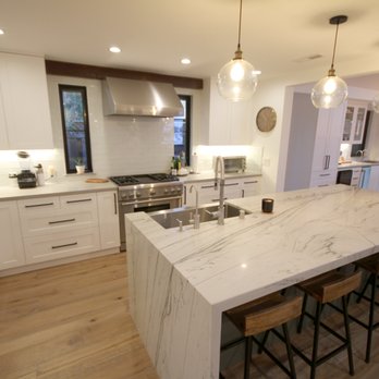Kusalo Construction - a kitchen with a marble island - General Contractors Near Me - San Jose, California