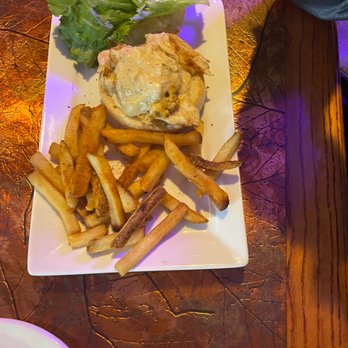 Pine Lodge Steakhouse - a plate of french fries and a burger - Steakhouses Near Me - McHenry, Maryland