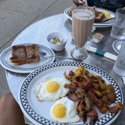 Two 2 Eggs Any Style with Ham, Bacon and Sausage