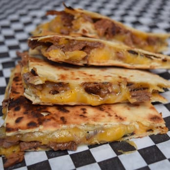 Holy Moly Truck - a stack of quesadillas - Food Trucks Near Me Holy Moly Truck - a stack of quesadillas - Food Trucks Near Me