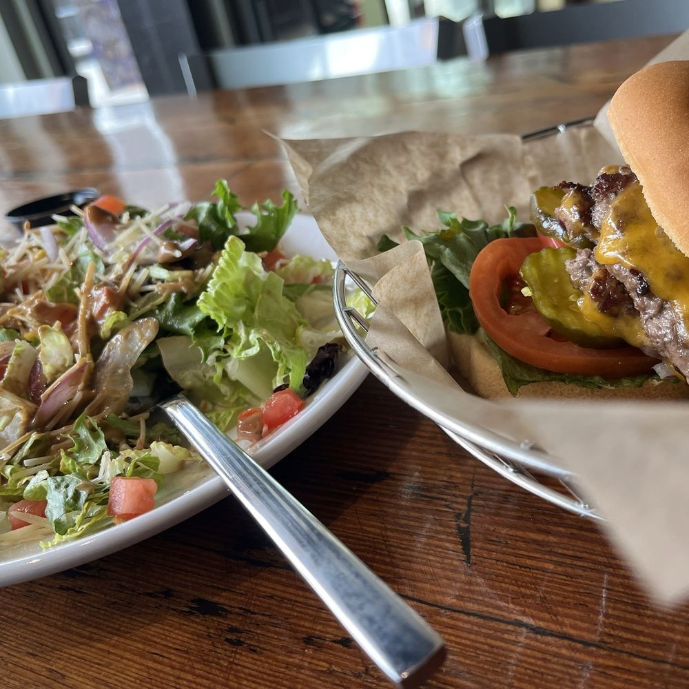 Tallgrass Tap House - Tallgrass burger with GF bun, Tap House side salad no croutons and vinaigrette dressing. - New American Near Me - Manhattan, Kansas Tallgrass Tap House - Tallgrass burger with GF bun, Tap House side salad no croutons and vinaigrette dressing. - New American Near Me - Manhattan, Kansas