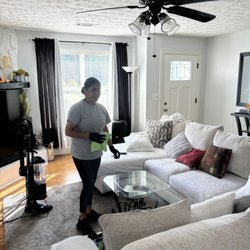 Palacios Cleaning Services - Cleaning a living room