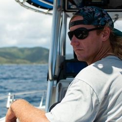 Blue Canyon Charters - Deckhand Alex outeitting the fish.