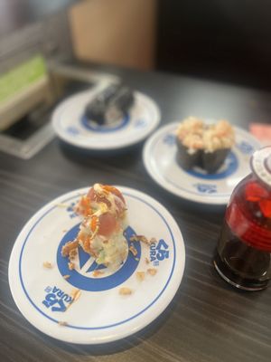 Kura Revolving Sushi Bar by null