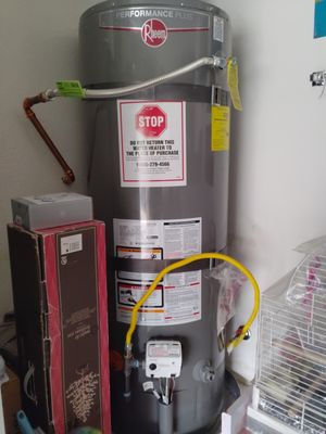 50 Gallon Hot Water Heater Replaced - Old Water heater was leaking. Removed disposed of and Installed a New 50 Gallon hot water heater with code upgrades. 50 Gallon Hot Water Heater Replaced - Old Water heater was leaking. Removed disposed of and Installed a New 50 Gallon hot water heater with code upgrades.