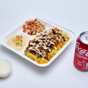 Mayyas Express - a tray of food and a can of soda - Lebanese Near Me - Toronto, Ontario Mayyas Express - a tray of food and a can of soda - Lebanese Near Me - Toronto, Ontario