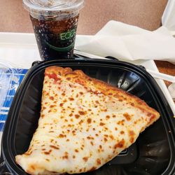 Henry's Cafe - Piece of cheese pizza and a diet Pepsi . Grabbing lunch and resting legs