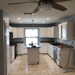 Landmark Property Services - Kitchen remodel, new marble flooring, cabinet paint, wall paint, new tops, new recessed lighting, etc.