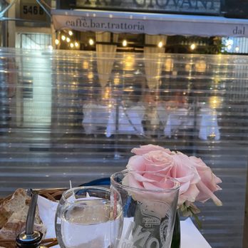3 Giovani - we sat out side, table with flowers and real flame candle lamp. this shot looks into the resturant - Pizza Near Me - New York, New York 3 Giovani - we sat out side, table with flowers and real flame candle lamp. this shot looks into the resturant - Pizza Near Me - New York, New York
