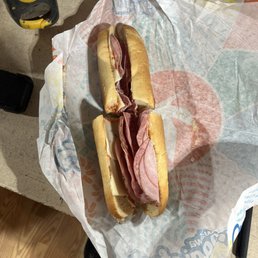 a sub sandwich on a wrapper