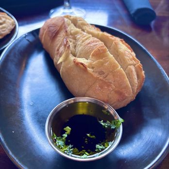 Cynara Restaurant & Lounge - Warm baguette: extra virgin olive oil, balsamic, fresh herbs. I love bread. - New American Near Me - Olympia, Washington Cynara Restaurant & Lounge - Warm baguette: extra virgin olive oil, balsamic, fresh herbs. I love bread. - New American Near Me - Olympia, Washington