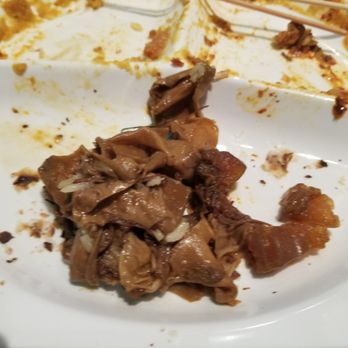 Food Terminal - The pile of skin I peeled off my beef, a piece of mostly fat that was given to us under the pretext of being a piece of beef, and an eyelash - Malaysian Near Me - Chamblee, Georgia