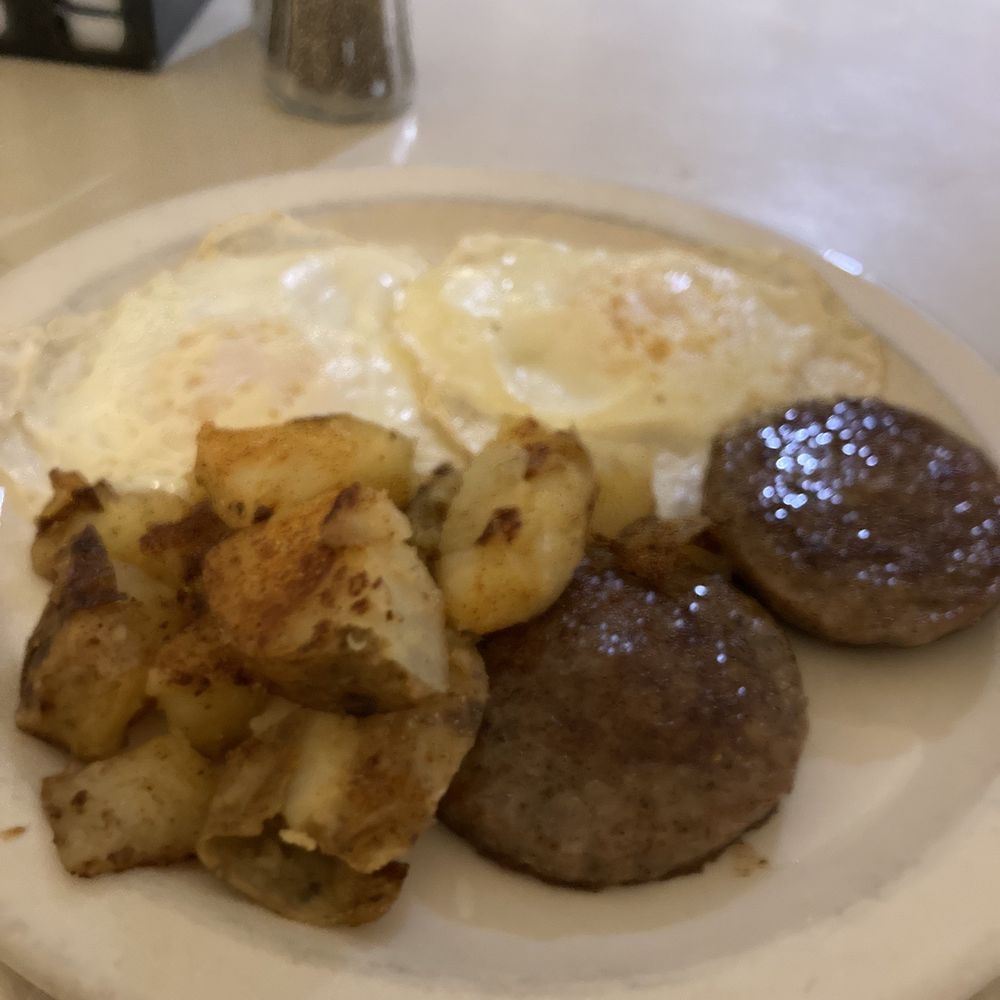 The Frying Pan - Breakfast platter (over medium eggs, sausage, potatoes) - Breakfast & Brunch Near Me - Lusby, Maryland The Frying Pan - Breakfast platter (over medium eggs, sausage, potatoes) - Breakfast & Brunch Near Me - Lusby, Maryland