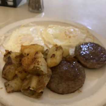 The Frying Pan - Breakfast platter (over medium eggs, sausage, potatoes) - Breakfast & Brunch Near Me - Lusby, Maryland The Frying Pan - Breakfast platter (over medium eggs, sausage, potatoes) - Breakfast & Brunch Near Me - Lusby, Maryland