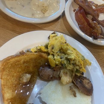 Simmer Down - Biscuits & gravy plus bacon; French toast, scrambled eggs with peppers, grits, potatoes, and sausage-- delicious! - Comfort Food Near Me - Georgetown, Texas