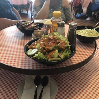 Schoolhouse Restaurant - Lazy Susan in the center of the table had salad and coke slaw waiting for us - American Near Me - Camp Dennison, Ohio