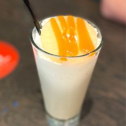 Red Robin Gourmet Burgers and Brews - NEW Pineapple Upside-Down Cake Milkshake with a shot of Captain Morgan