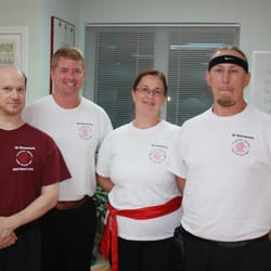 Qi Elements Center For Taijiquan And Qigong - Senior students (left to right) Marc, Dave, Katya and Rich assist Shifu Roger with instruction in Taijiquan.