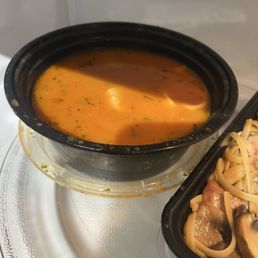 Broth with some frozen seafood...