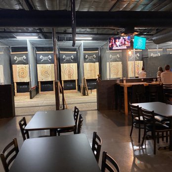 BATL Axe Throwing - a man throwing a bat - Axe Throwing Near Me - Scottsdale, Arizona