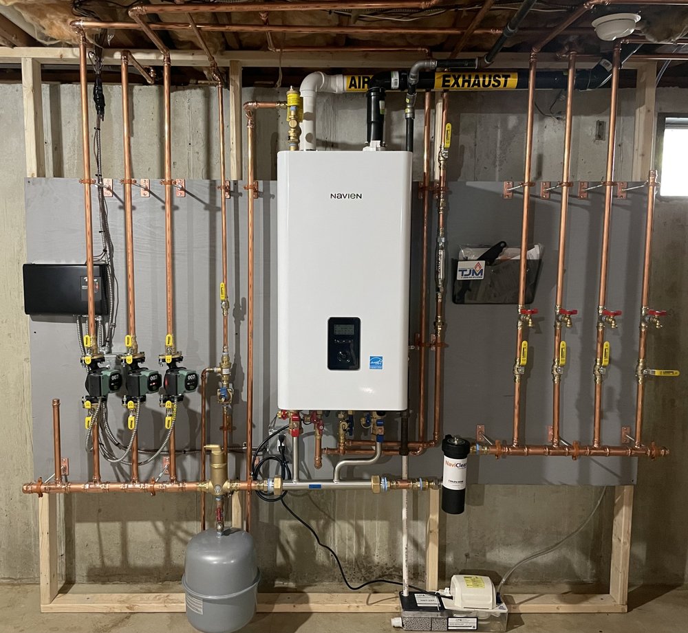 Slide of TJM Plumbing & Heating