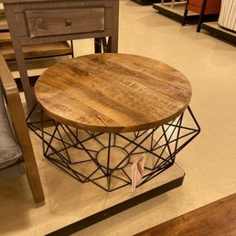 Exterior outside entrance of HomeGoods - Table that was on clearance before Manager Liliana took clearance sticker off. - Chelsea, Massachusetts Exterior outside entrance of HomeGoods - Table that was on clearance before Manager Liliana took clearance sticker off. - Chelsea, Massachusetts