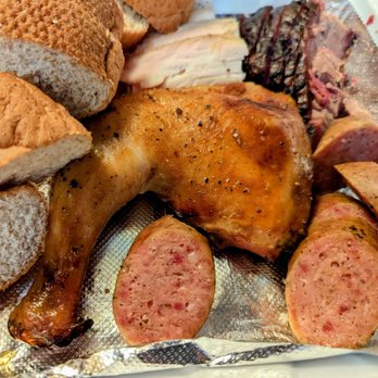 The County Line - Close up of the Emergency kit-4 meats and bread - Barbeque Near Me - Austin, Texas The County Line - Close up of the Emergency kit-4 meats and bread - Barbeque Near Me - Austin, Texas