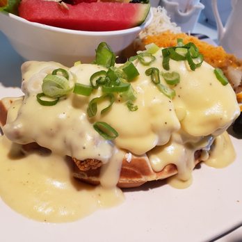 Allô! Mon Coco - Waffle, fried chicken, egg Benny and house famous potatoes with half Swiss & half cheddar cheese. All that with a gigantic fruit bowl. - Breakfast & Brunch Near Me - Brossard, Quebec Allô! Mon Coco - Waffle, fried chicken, egg Benny and house famous potatoes with half Swiss & half cheddar cheese. All that with a gigantic fruit bowl. - Breakfast & Brunch Near Me - Brossard, Quebec